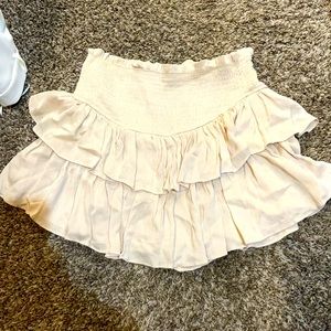 Vestique mini skirt. Size M, cream.